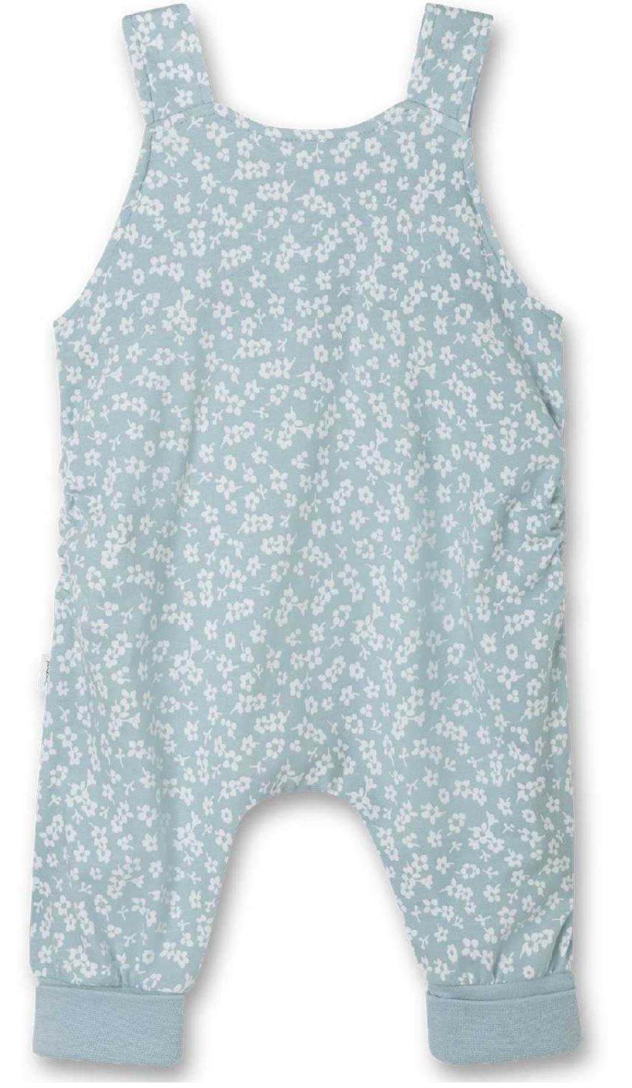 Ein hellblauer Sanetta Kinderoverall mit weißem Blumenmuster. Der Sanetta - Strampler/Overall hat breite Schulterträger und zeichnet sich durch eine lockere Passform mit gerafften Beinabschlüssen aus. Aus weichem und bequemem Stoff gefertigt, sind diese mitwachsenden Overalls perfekt für die Freizeit.