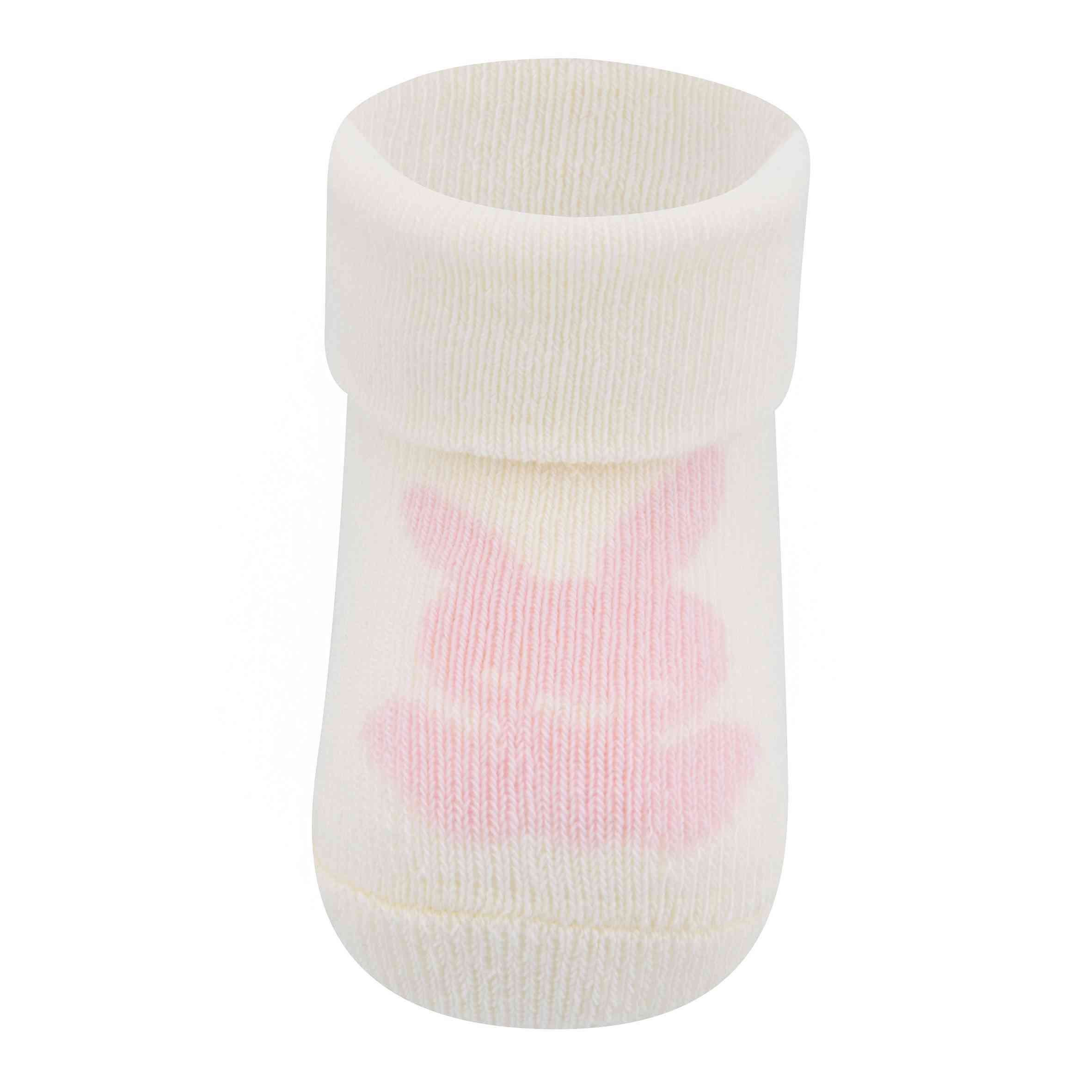 Eine einzelne weiße Babysocke mit umgeschlagenem Bündchen und einem rosa Häschenmotiv auf der Vorderseite. Das ewers - Babysocken 3er Pack GOTS von Ewers steht aufrecht, so dass das Häschen deutlich zu sehen ist.